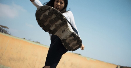 woman kicking the air